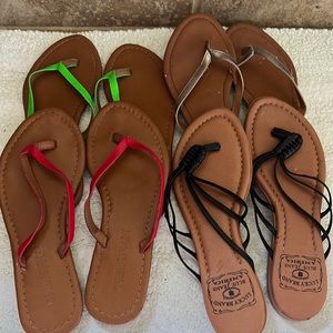 4 pairs of flip flops